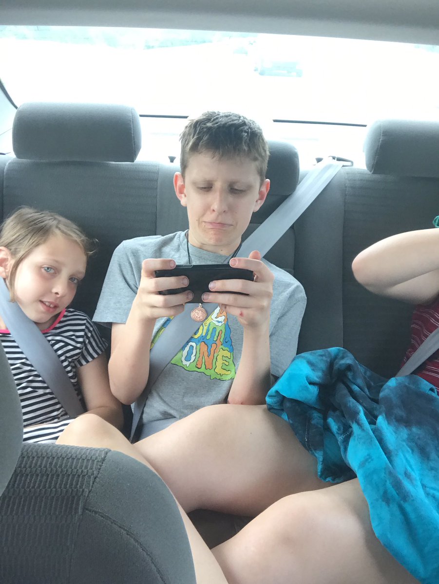 ekmlarr's tweet photo. #RenFaireRoadtrip2017 Heading Home: both girls have their legs swung across brother's lap (stuck in the middle). #rideinstyle #goodbro https://t.co/ajzwAZ3wYk