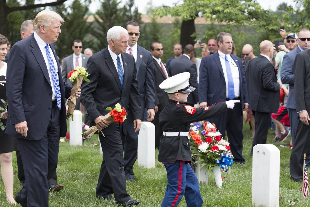 Scavino45's tweet photo. .@POTUS &amp; @VP are guided by 6-year-old Christian, son of fallen US Marine Sgt. Christopher Jacobs, to his father’s grave at @ArlingtonNatl. https://t.co/eACeV9ZMIe