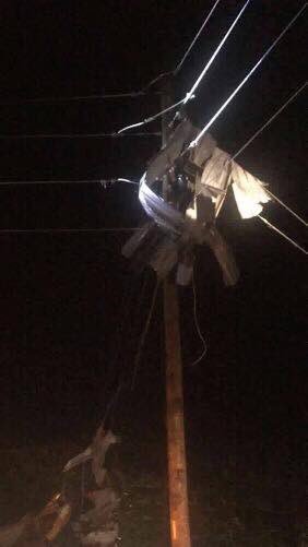 SouthRiverEMC's tweet photo. Last night's storm destroyed a chicken house off Tyndall Bridge Rd. In Sampson County blowing sheets of metal into our power lines. https://t.co/POA4exntia