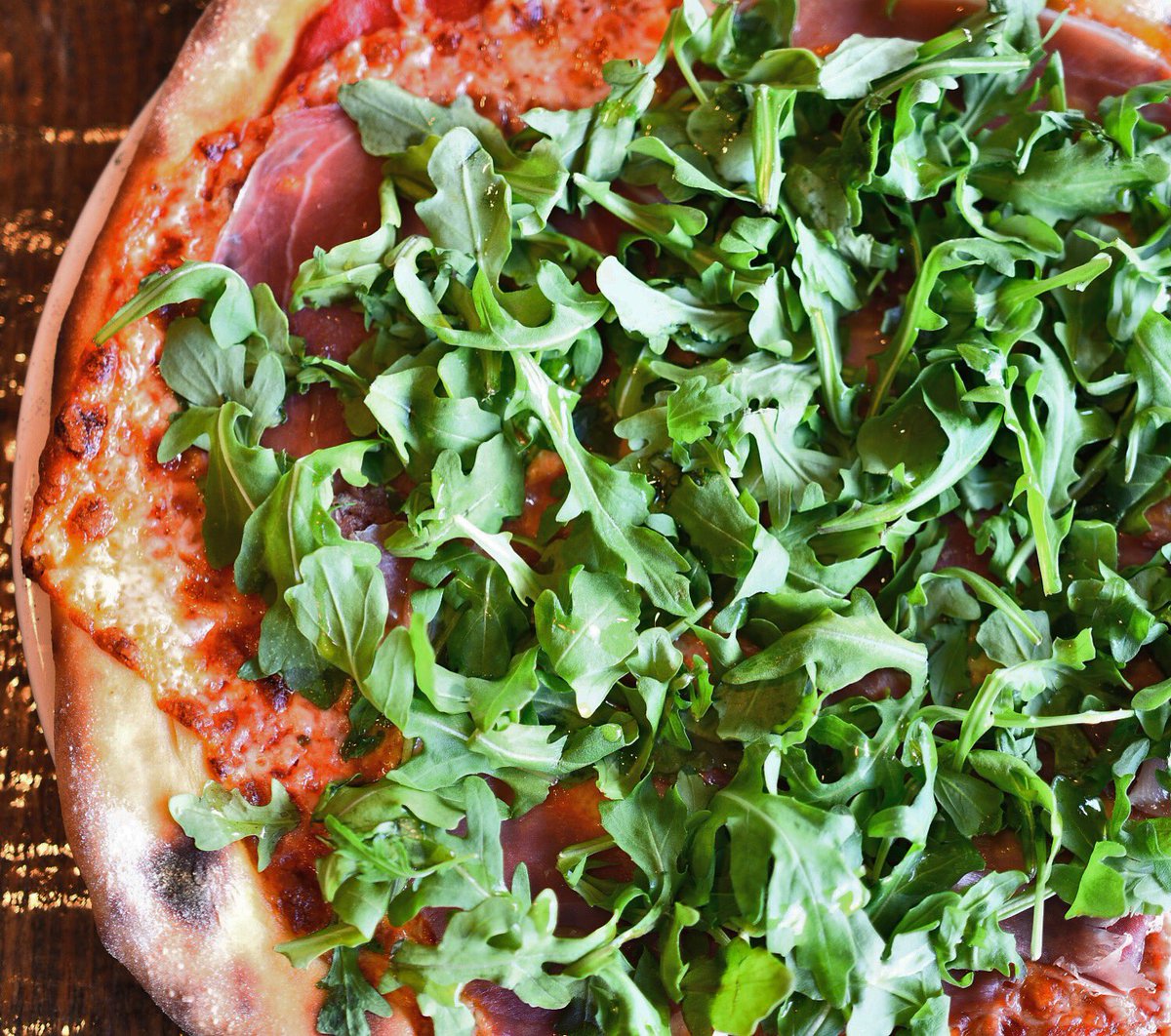 A #pizza covered in greens is basically a #salad, right?