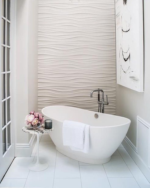 RethinkInterior's tweet photo. We love the simplicity of this white bathroom. The textured wave effect tiles create a relaxing atmosphere. #rethi… https://t.co/3UHu3n87cW https://t.co/o9gPtIbMhd