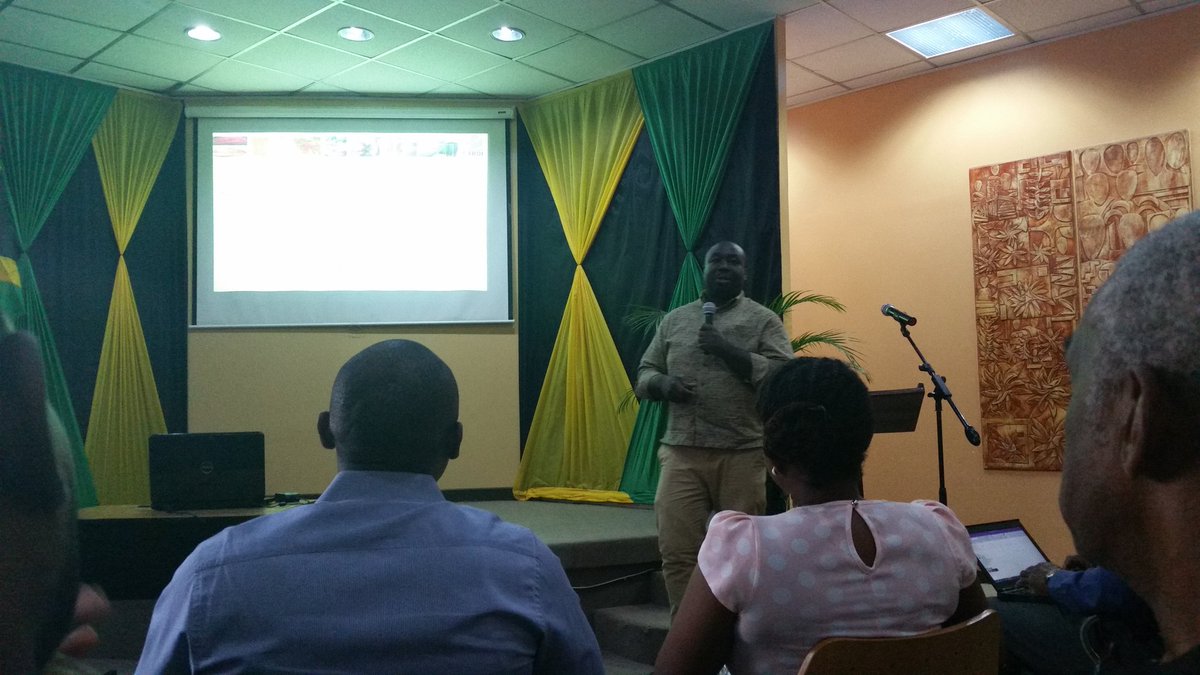 Mr Rohan Smith from CARDI presenting on some key things to consider when growing Castor bean in Jamaica.