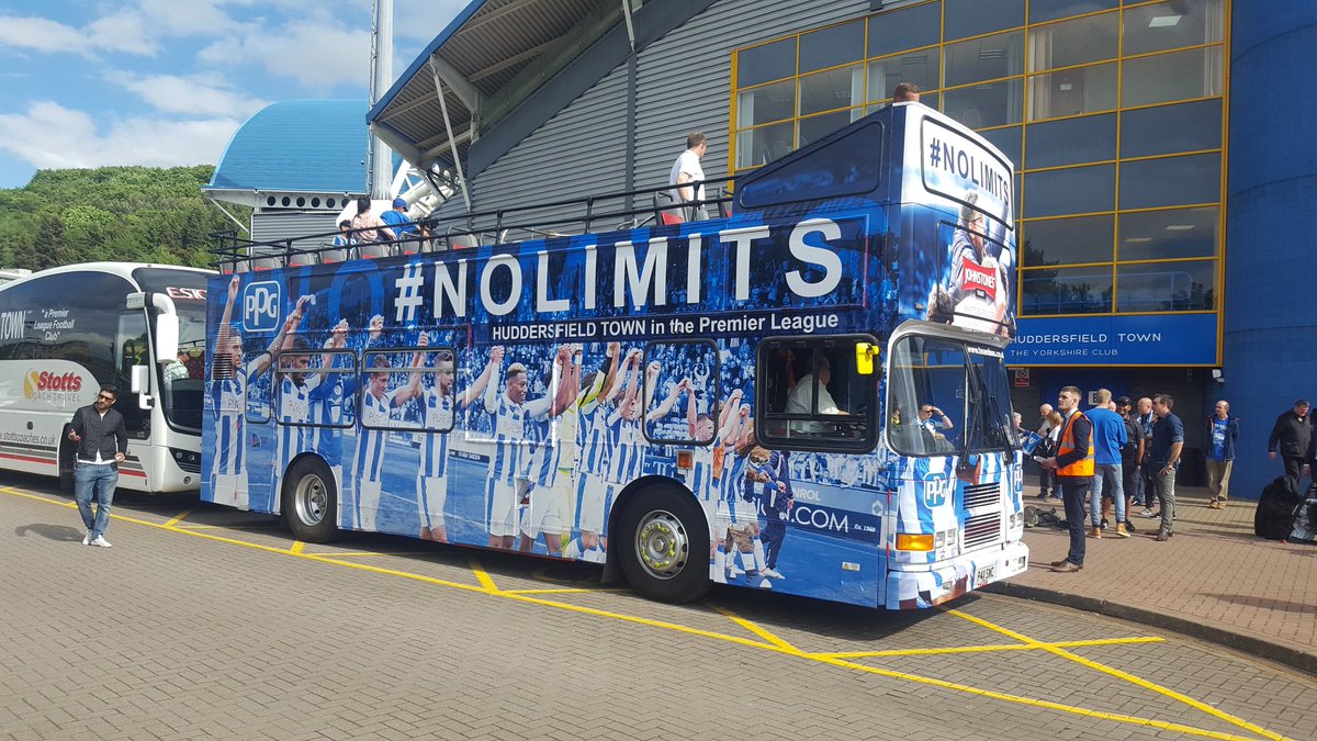 The parade bus is sat outside the John Smith's Stadium ready, going to be a great evening of celebration! #htafc #EFL #PremierLeague