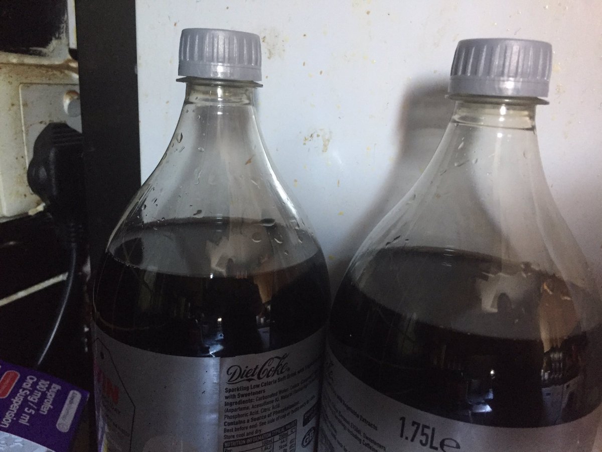 ScarlettParties's tweet photo. Just bought these 2 identical bottles of @CocaCola from the supermarket, different fill levels? Or wonky eyes? #feelingshortchanged https://t.co/XFGlxI0r8e