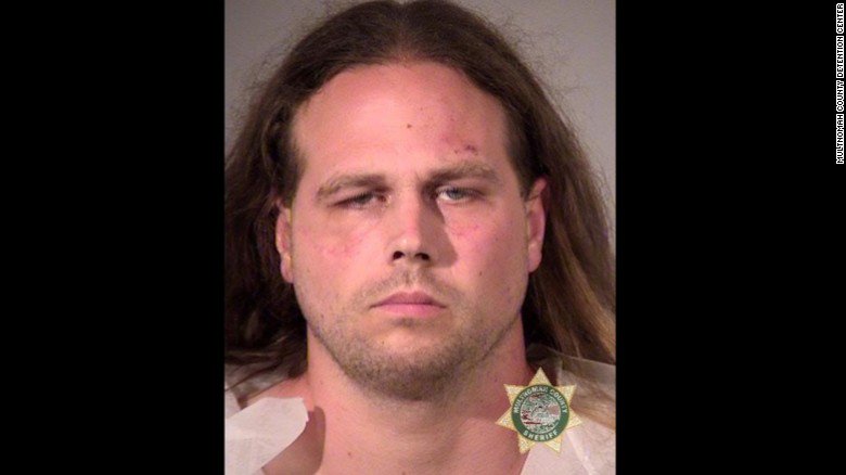 CNN's tweet photo. Portland suspect in court: "Get out if you don't like free speech" and "You call it terrorism, I call it patriotism" https://t.co/yCArfWtznw https://t.co/2t0jqoqn93