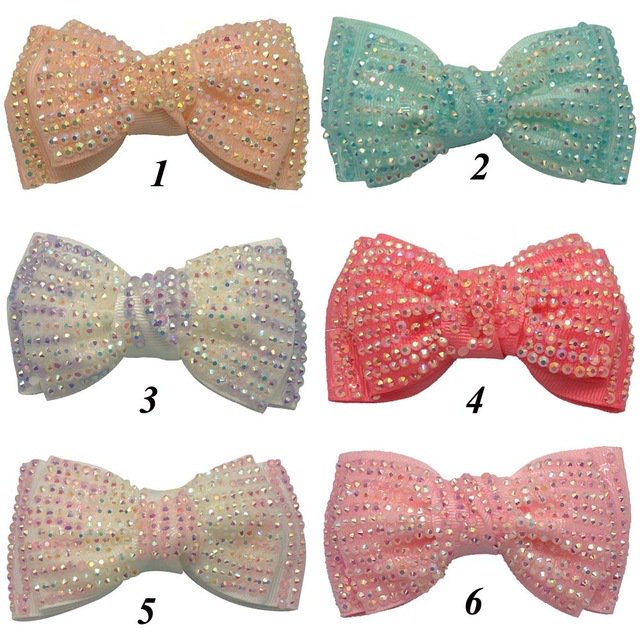 Rhinestone Bow With Black Clip for kids
Choose your favorite color
@AfricaFashGuide 
arteio.com.ng #arteionigeria