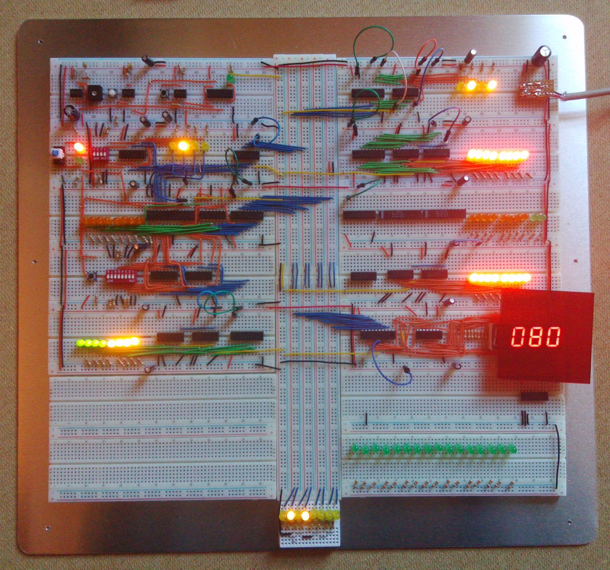 _WayneBooth's tweet photo. Progress on the 8 bit #BreadboardComputer.
Mounted on an aluminium backplate. 
Just the multifunction ALU, UI and control sequencing to go. https://t.co/GuAFztz01Q