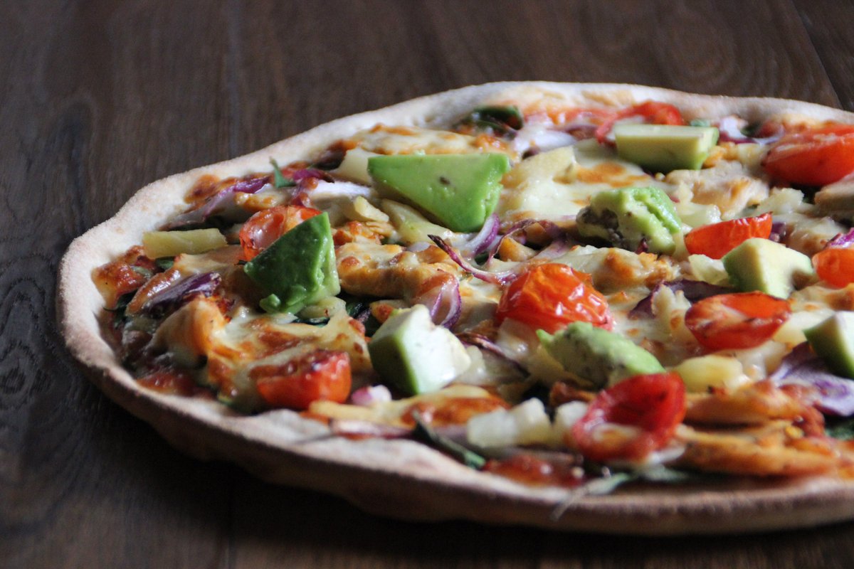 Get your hands on our CHICKEN AVOCADO PIZZA: Roast chicken breast, baby spinach, spanish onion, pineapple, cherry tomato and fresh avo!