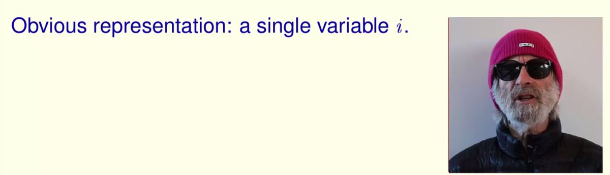 Leslie with sunglasses and a ski hat.