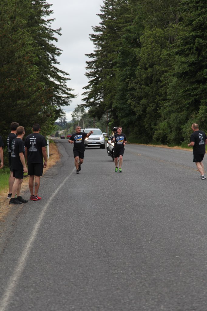 CBPNorthwest's tweet photo. U.S. Border Patrol's Blaine Sector carries the torch during Special Olympics Law Enforcement Torch Run. #USBP #CBP #LETR2017 https://t.co/1jGwm82xjD