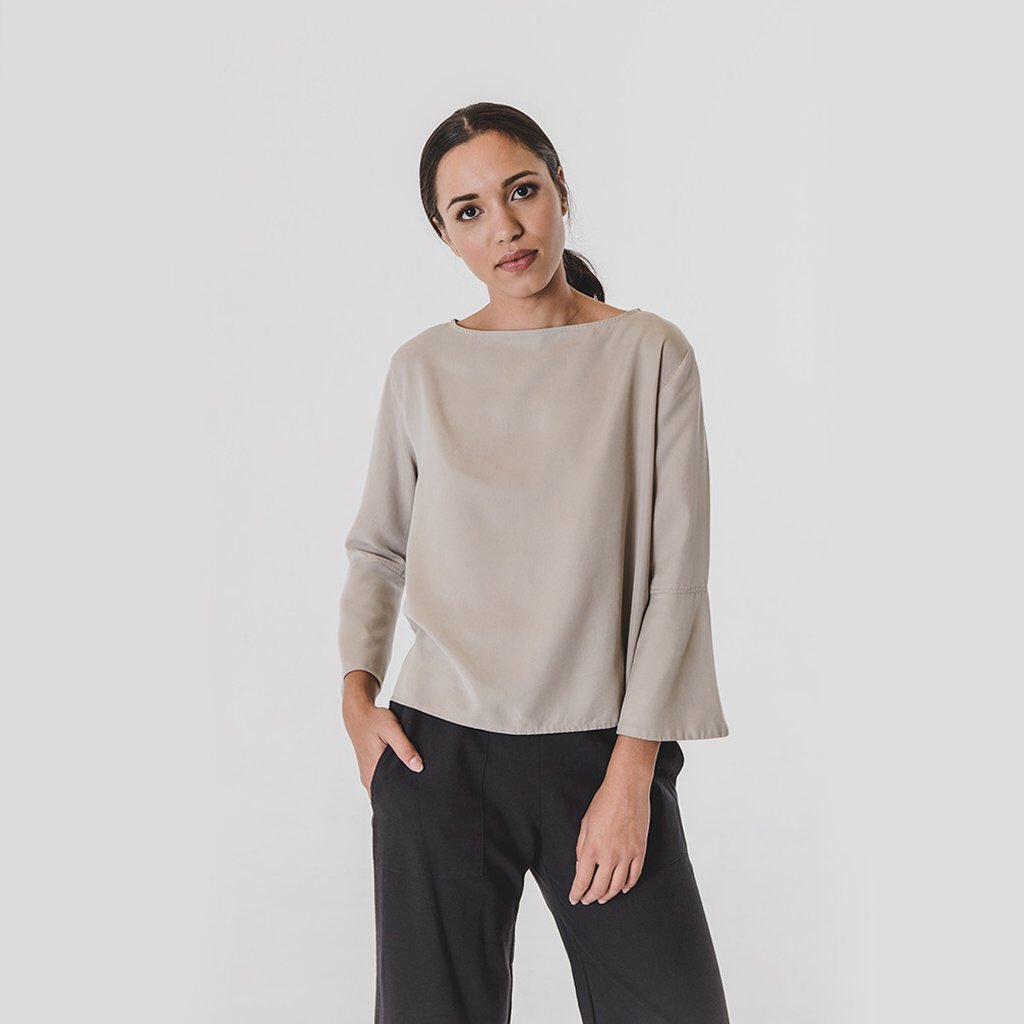 The Flute Top is made from pure Tencel, a luxurious fabric that breathes like cotton &amp; drapes like silk. Finished with fem fluted sleeves