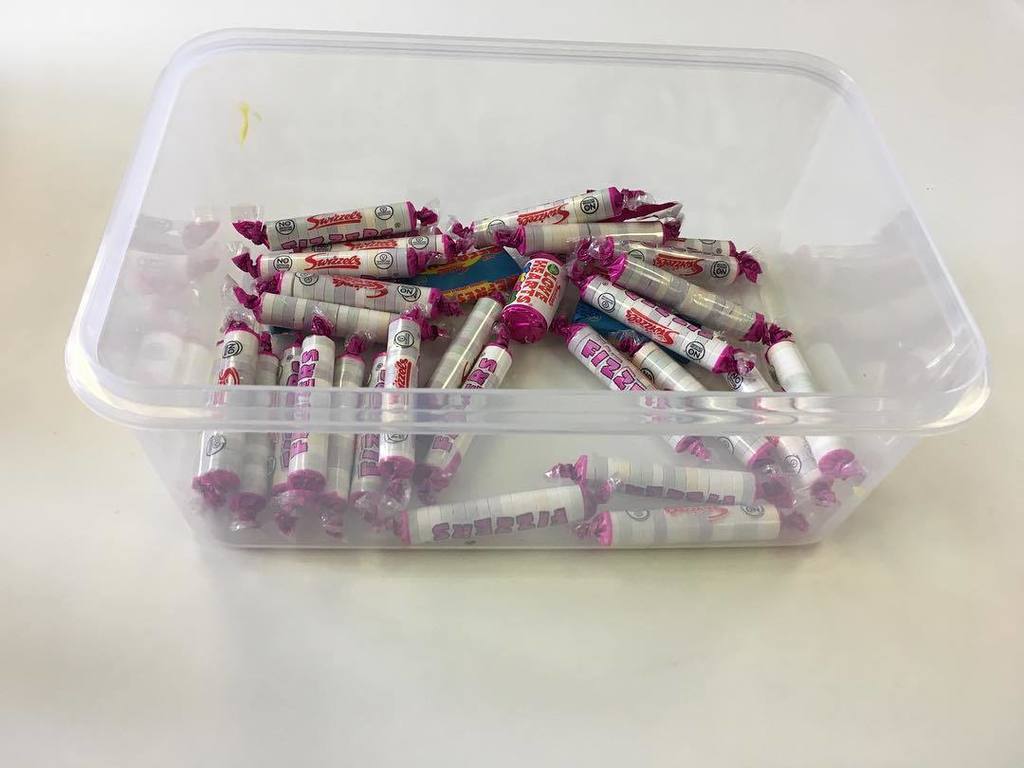 ellenhkwiggins's tweet photo. This box was brought into the office full of sweets and chocolates yesterday morning. By 5pm, this is how it had d… https://t.co/qPJtzpwpk8 https://t.co/xdhm7CHKtO