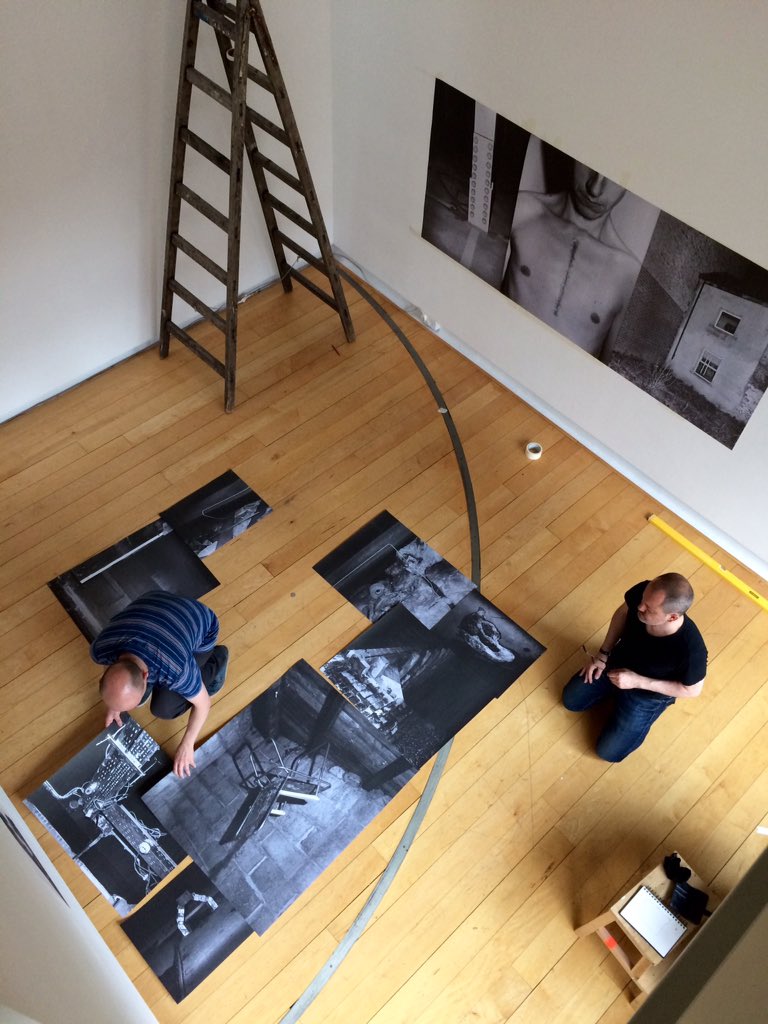 BAPhotoDIT's tweet image. The first row is up! Day 4 of the installation #LiminalActs @BAPhotoDIT @GOP_Ireland