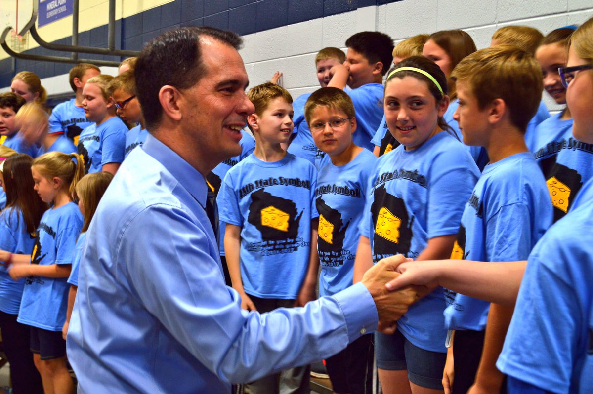 GovWalker's tweet photo. Joined the Mineral Point Elementary School's 4th graders to sign legislation declaring cheese the official dairy product of WI! https://t.co/Xbf65NVPG1