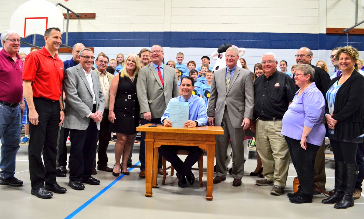 GovWalker's tweet photo. Joined the Mineral Point Elementary School's 4th graders to sign legislation declaring cheese the official dairy product of WI! https://t.co/Xbf65NVPG1