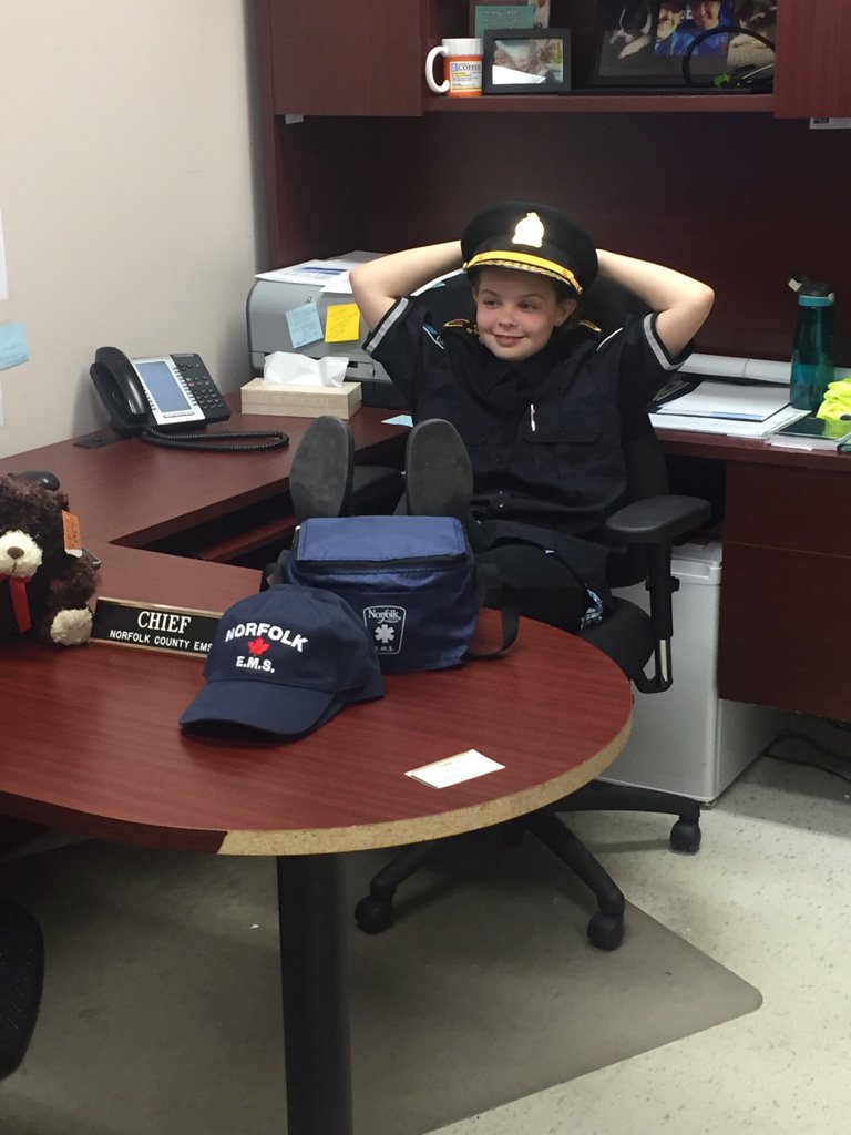 NorfolkEMS's tweet photo. Chief for a Day Chloe in her new office. Already did vehicle/radio checks and met staff! #PSweek2017 @OAPCMedia https://t.co/MMTUJ3E6I1