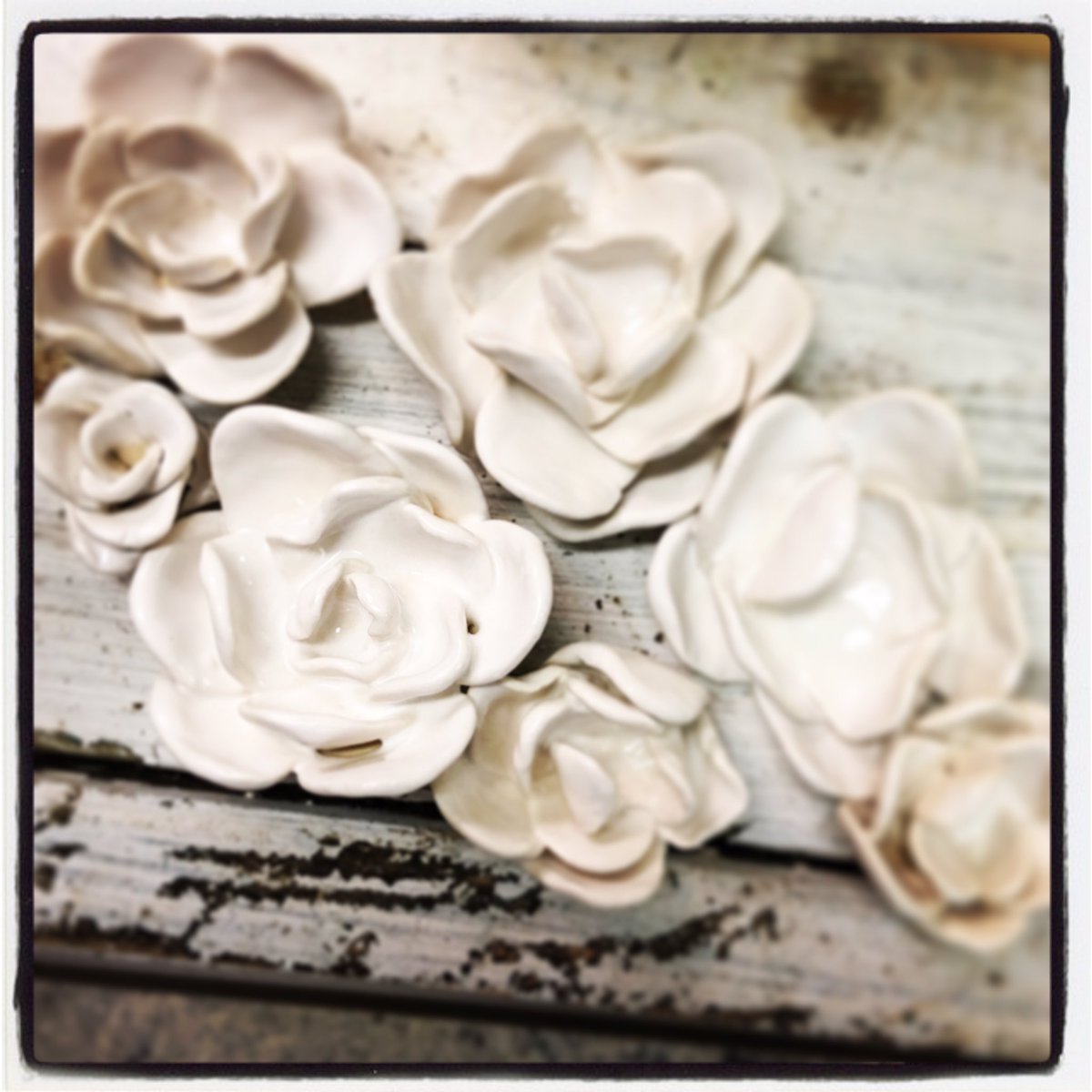Fresh batch of white blooms awaiting to be made into jewelry.  #pottery #muskoka #bracebridge #carmensomervillepottery