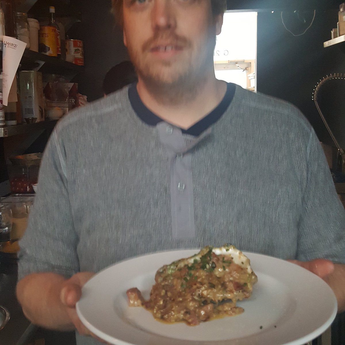 Hanksvic's tweet image. Baked Cortez oyster with homemade ham and Clark&apos;s happy face.  #cripplingpain #systemlockout #sodumb