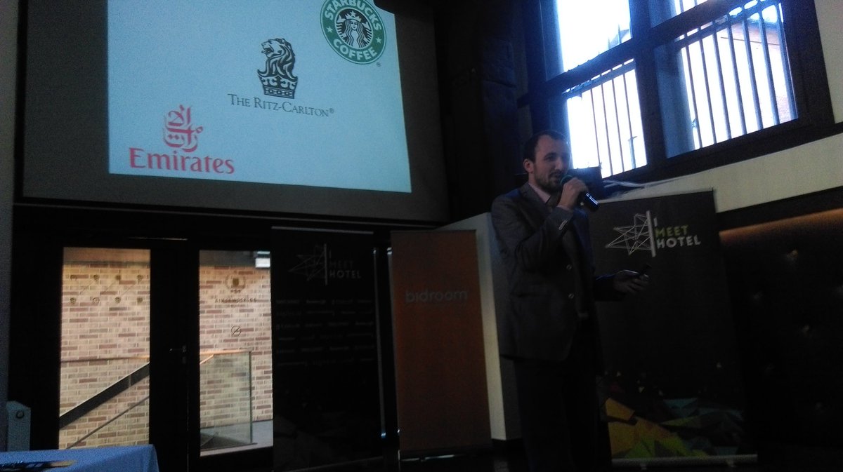 Our first speaker <a href="/szymon_lach/">Szymon</a> on the stage right now, talking about the process of building long-term relationships with guests #imeethotel