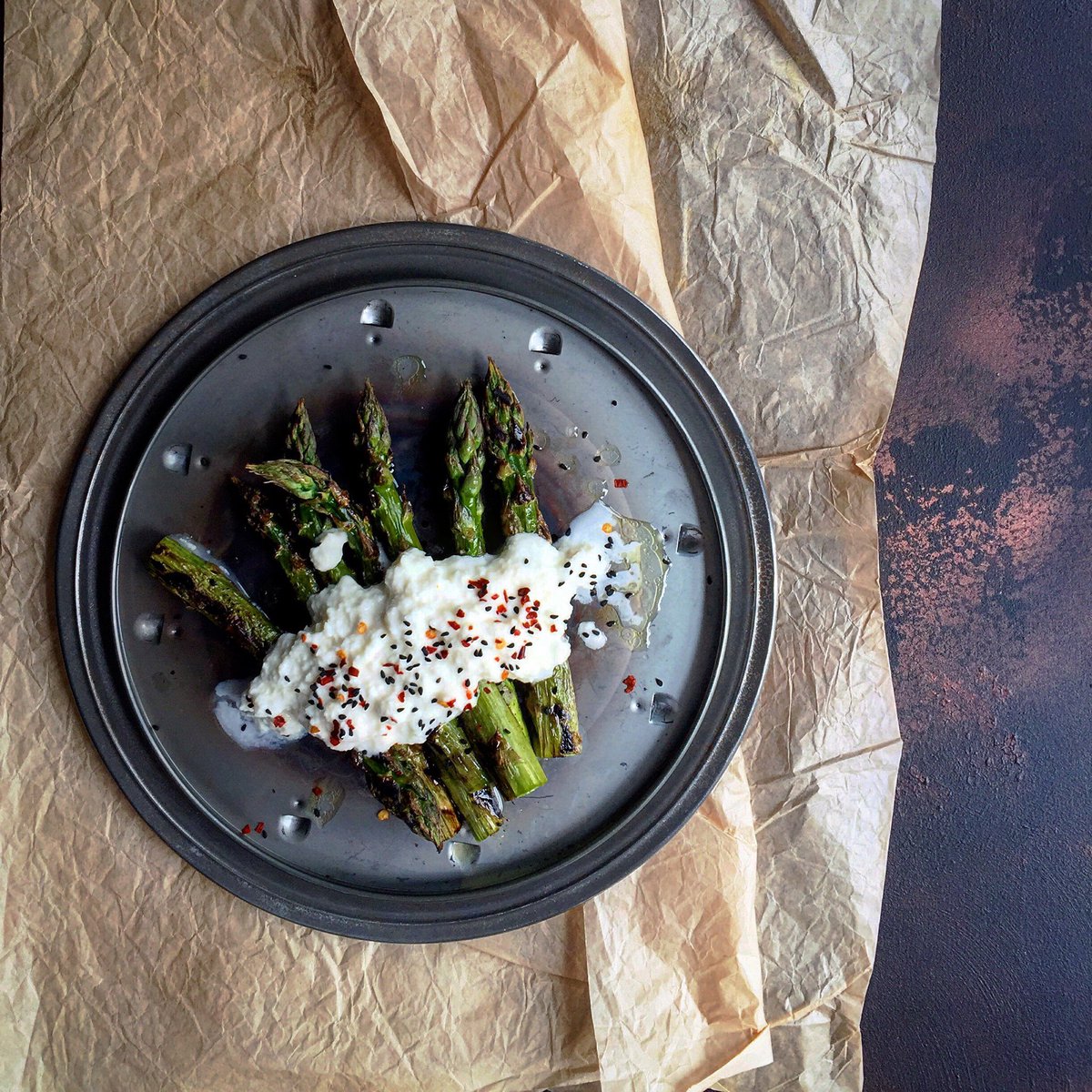 ckbk's tweet photo. Burrata and asparagus w. nigella seeds from #RoundToOurs by @IamLauraJackson and @Alicelevine (pub. @QuadrilleBooks) https://t.co/yMygDTuEf2