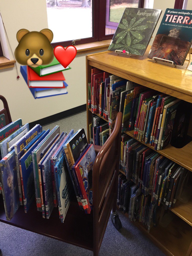 CESLibMedia's tweet photo. Got some #volunteerhelp to shelve Spanish+ #bilingual bks w/ English for 1 beautiful #duallanguage collection #chccs https://t.co/r9IobwrUtz