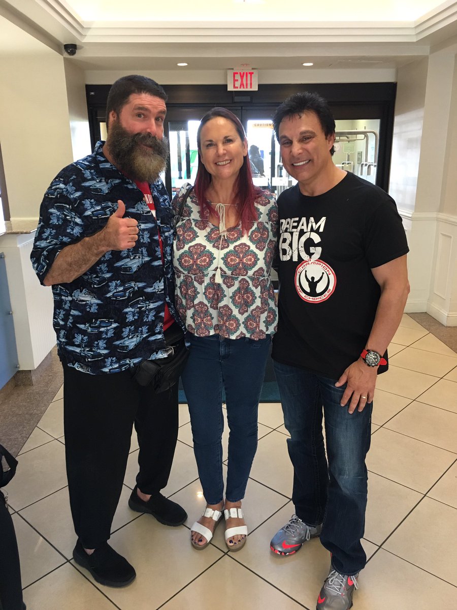 MarcMero's tweet photo. What a treat! On our #TimeisNowTour and run into @RealMickFoley and his beautiful wife Colette. Great conversation with amazing friends! https://t.co/H3HeXO3hjy