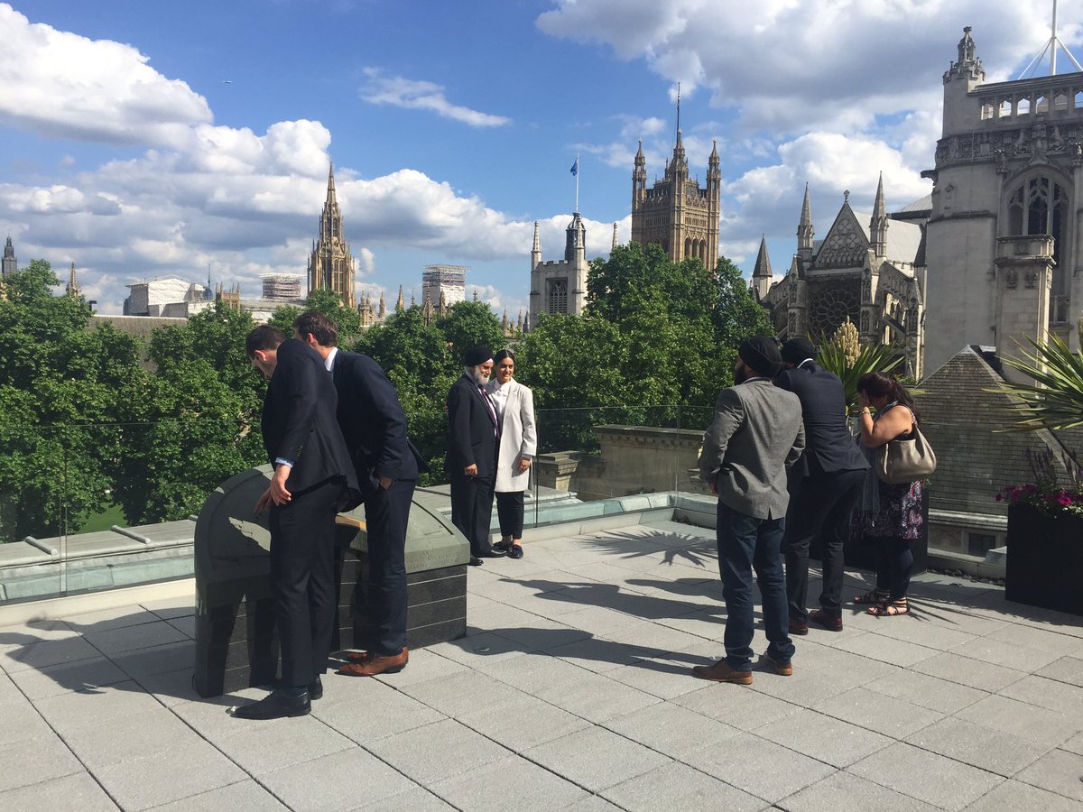 amanda_clack's tweet photo. One of my favourite roles: welcoming our new #MRICS professionals - what a great day for photos on the #RICS balcony too @LondonSurveying https://t.co/REIjoPgowW