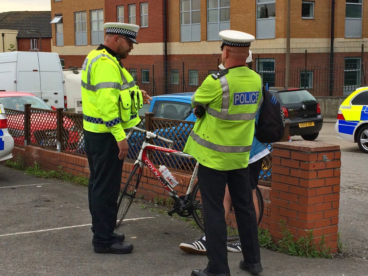 ASPolice's tweet photo. Educating a cyclist for running a red light and swearing at our officer when asked to stop #OpClosePass #NotOnOurWatch https://t.co/tEfCpdGWvM