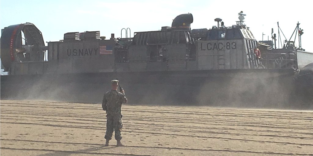 The_USO's tweet photo. This morning, a @USNavy LCAC landed on VA Beach to kick off #USOWarriorWeek. Follow the USO's Instagram story for more! #photooftheday https://t.co/6hbtzmDw1i