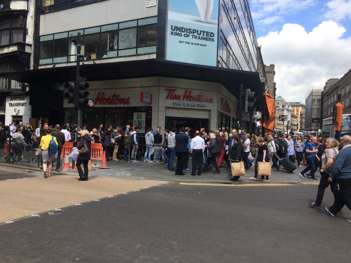 peteharding9's tweet photo. First @TimHortons in the UK &amp; Europe open today in Glasgow. What a crowd and great to see @CushWakeRtailUK https://t.co/vncudipFhQ