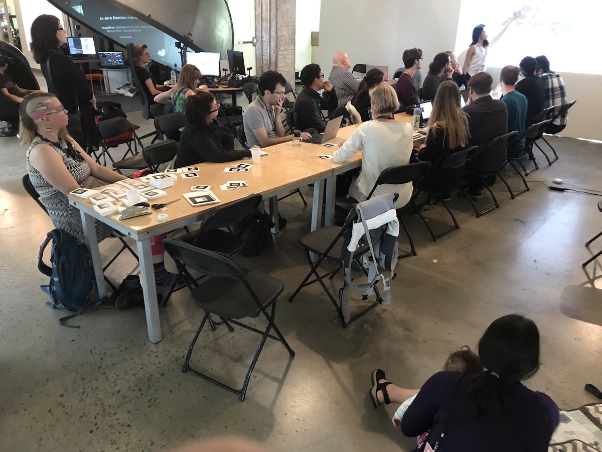 CourcheLuc's tweet photo. #ix_symposium @SATmontreal eleVR (M, Andrea, Evelyn) in action during a crash workshop on A-Frame and WebAR https://t.co/EucMx6D90g