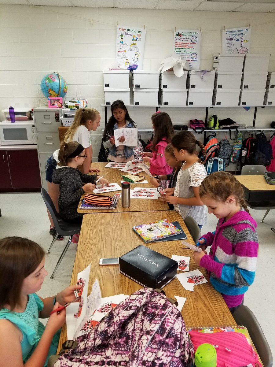 eveningstarep's tweet photo. Cutting out ESE logos for our custom shirts! #stylin #designedbykids https://t.co/BkRdBpYVsi