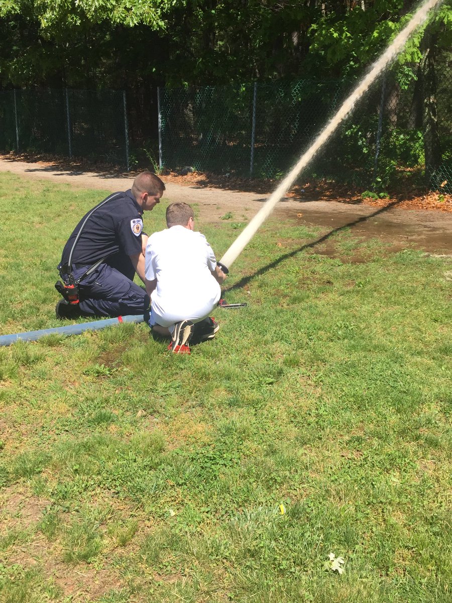 Members of the department helping with career day at the Plainville Public Schools