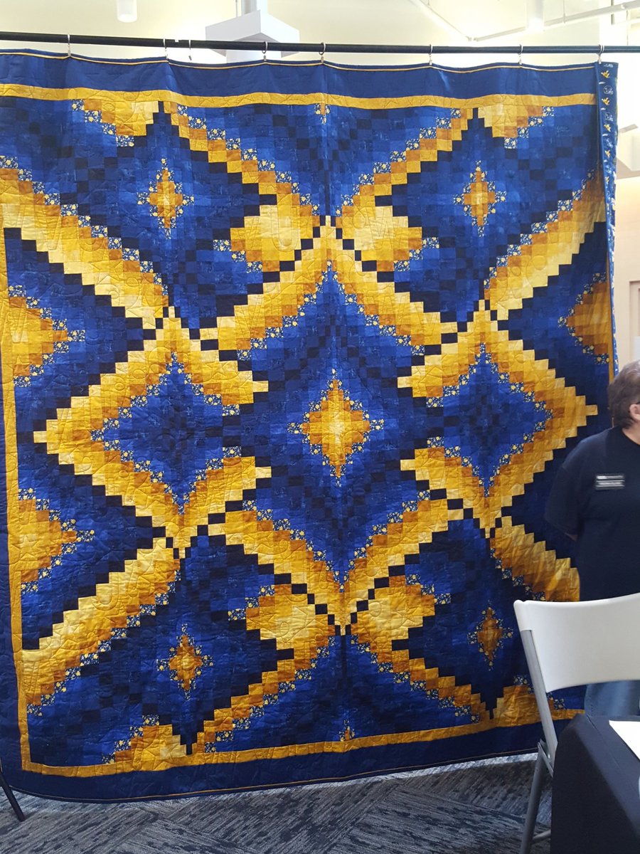 Emily_C_Sheperd's tweet photo. Clarksburg Area Model Railroad Club is in the meadowbrook mall raffling off this @WestVirginiaU quilt! $1/ticket. #wvu @WVUStudents https://t.co/PyIMHgu9nT
