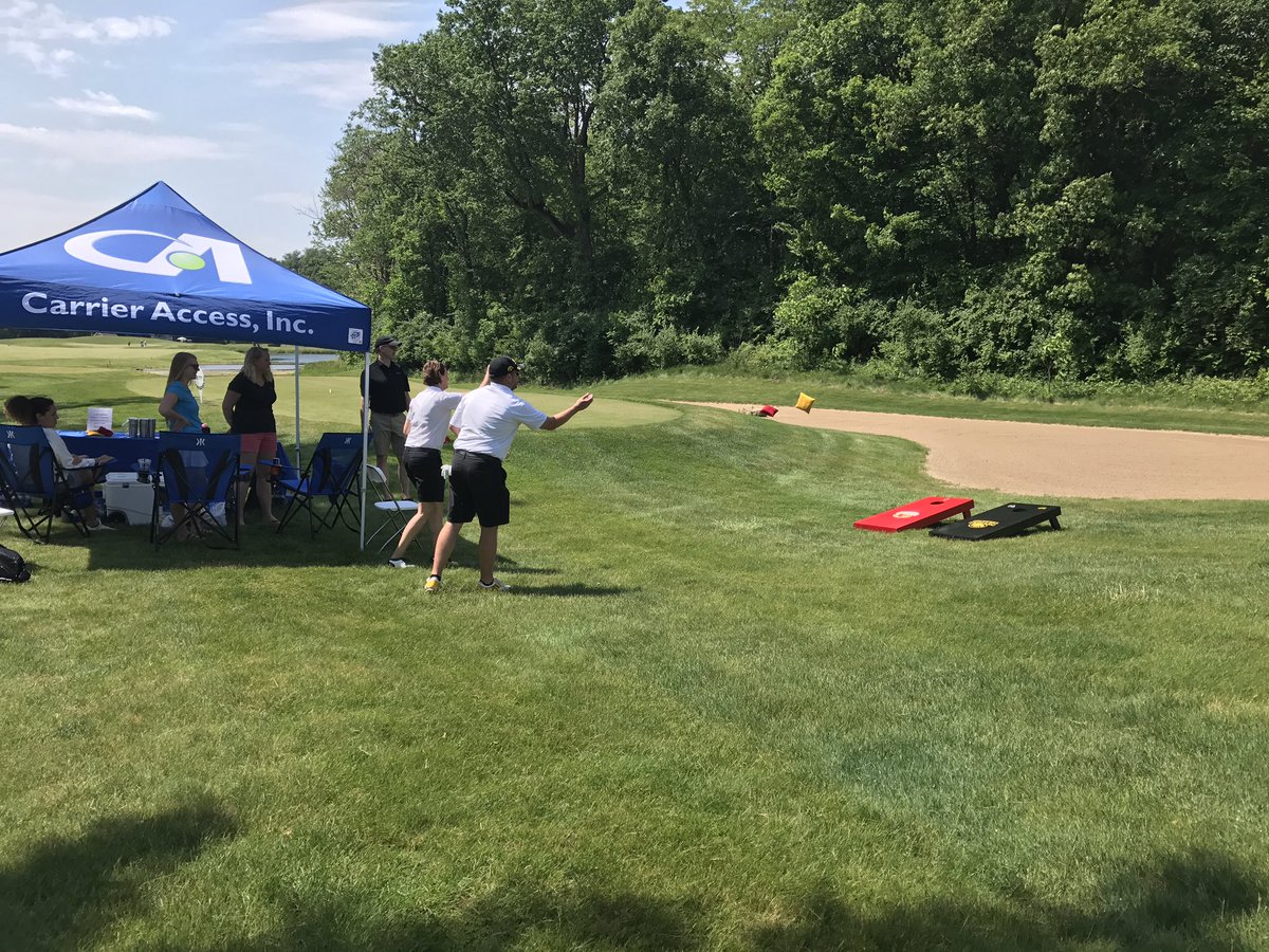 TechnologyIowa's tweet photo. .@bluprairietech playing bags for prizes with @CarrierAccess at the the #CXOpen ⛳️ https://t.co/F11kljFm5q
