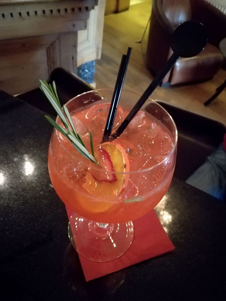 Perfect summer "Strawberry Spritz" - Strawberry and rosemary infused Aperol. Brockmans gin, fresh strawberry, Prosecco and a dash of Soda...