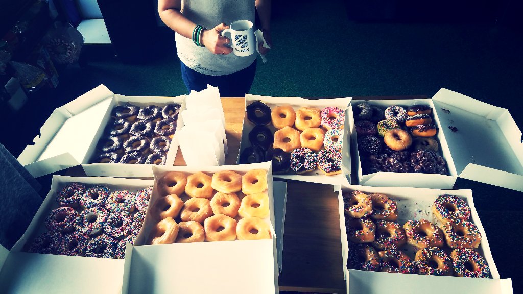 This is how the Z team celebrates #NationalDonutDay. ☕ 🍩 😋 (Thanks Howdy Donut!)