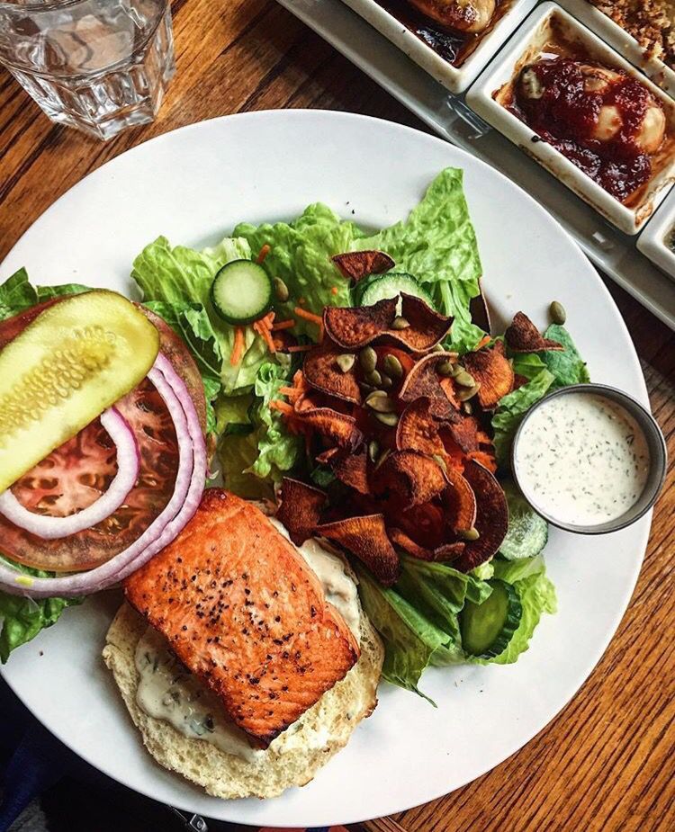 A #lunch for champions! The wild salmon burger: pan seared wild sockeye #salmon with house-made tartar sauce! Pic by Instagrammer <a href="/julumeow/">july</a>!