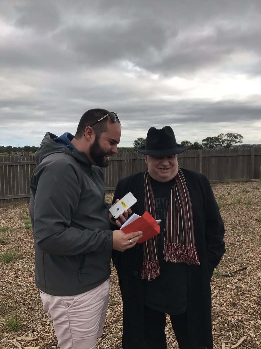 Turner__Amanda's tweet photo. .@CoxDan found Clue 4 at Maitland Jewish Cemetery. The red envelope was hidden in Joe Eisenberg's hat! @1233newcastle #DanAnda https://t.co/N2CB9IK0ZE