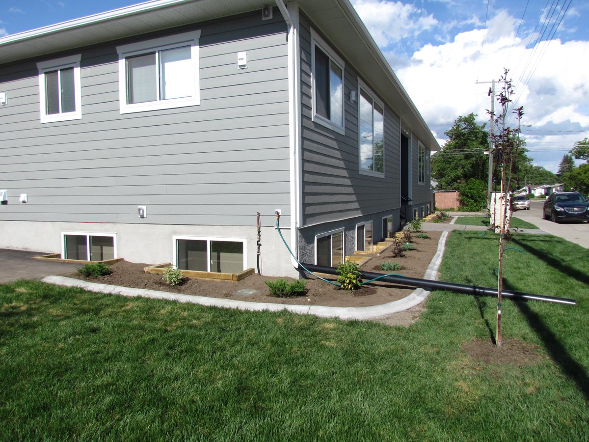 Work party organized by <a href="/karlawiens/">Karla Wiens</a> planted shrubs today at Dorie's House; thanks all. Also thanks Canadian Tire SC for donating the shrubs.