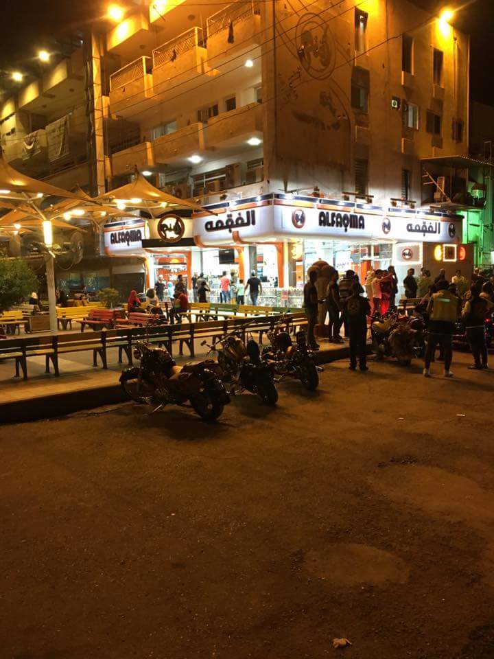 I_Nooralias_2's tweet photo. The reopening of Alfaqmq ice cream a few days after the bombing .
 ice cream is free served  as attribution for those were martyred . https://t.co/fW5LNKpH3z