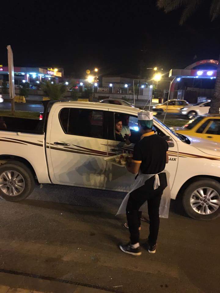 I_Nooralias_2's tweet photo. The reopening of Alfaqmq ice cream a few days after the bombing .
 ice cream is free served  as attribution for those were martyred . https://t.co/fW5LNKpH3z