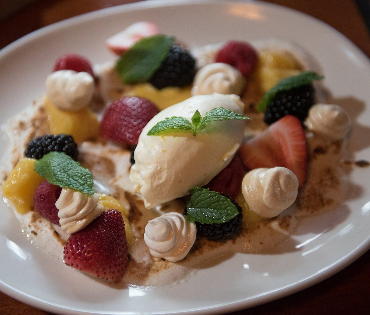 New on our summer menu from Chef Nathan - pavlova with berries.