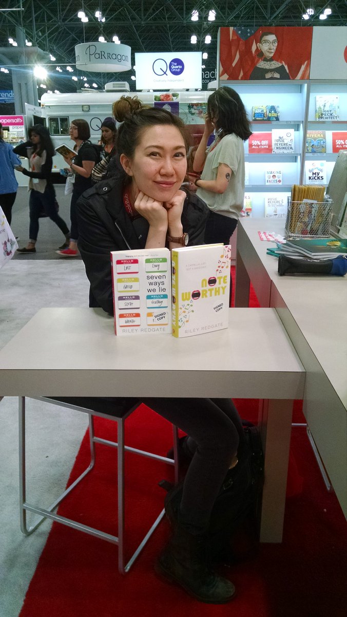 PiqueBeyond's tweet photo. Look who dropped by @thebookcon to sign #NoteworthyBook & #SevenWaysWeLie. #RileyRedgate #TheBookCon https://t.co/JOnPXfJD0i