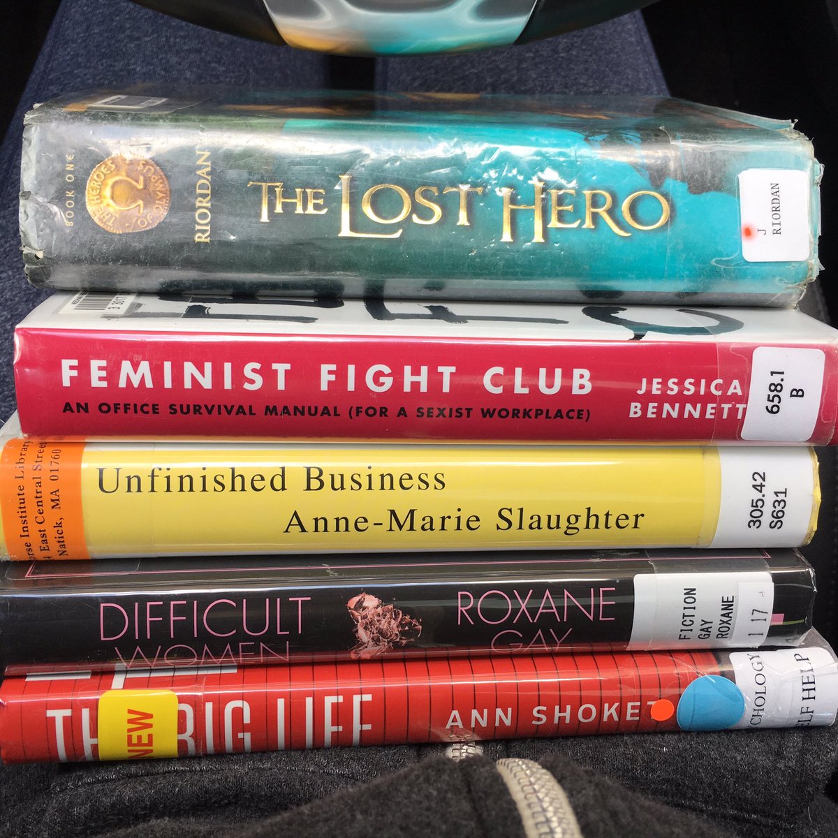 egrfaia's tweet photo. Oh no. My library delivered a bunch of books I requested. Guess which one is not mine? #BetterGetReading #Women #Leadership #SummerChallenge https://t.co/XeoxJ1A36c