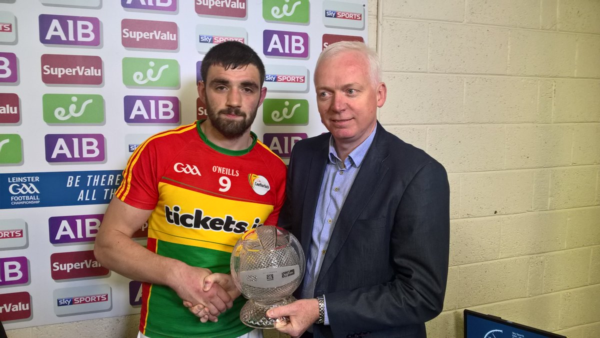 gaaleinster's tweet photo. @Carlow_GAA Sean Murphy receives  @AIB_GAA Man of match award from Ray Lynch following tonight's @gaaleinster Q/F loss to @DubGAAOfficial https://t.co/NpxUsfcBck