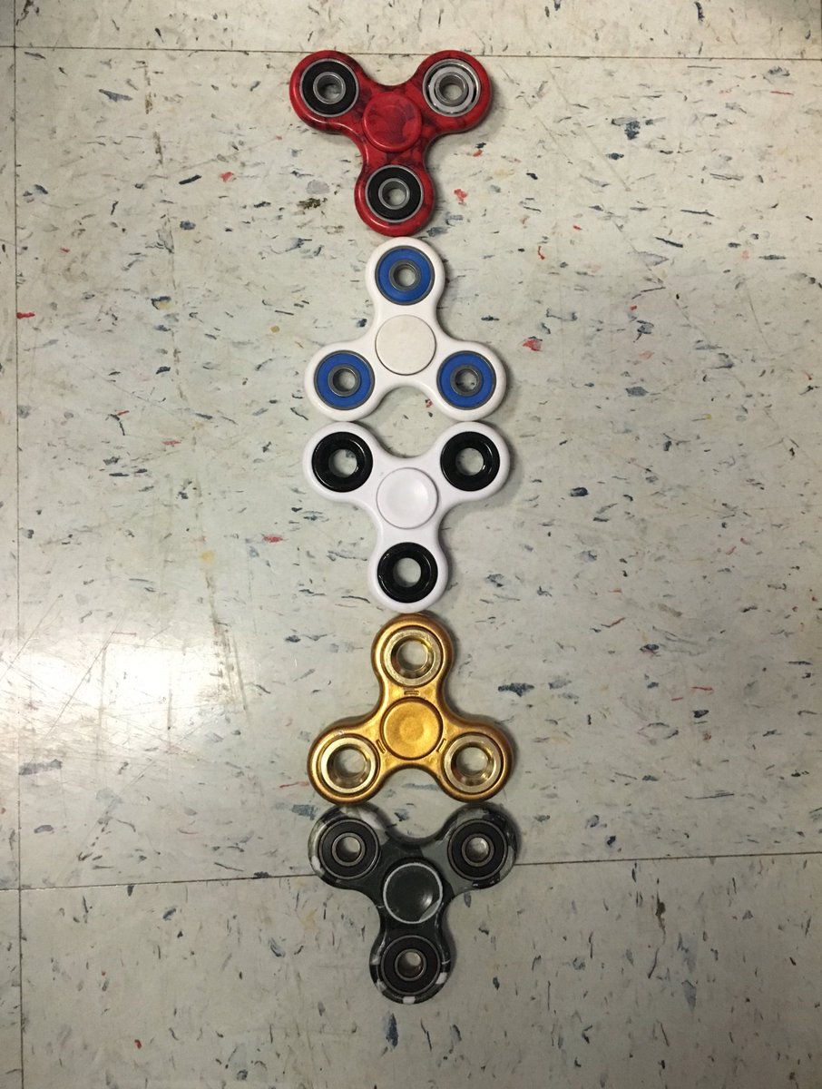 Mrs_Clark_'s tweet photo. Gathered some data to figure out how many fidget spinners it would take to reach across the classroom! 1st our class, next the entire hall!😏 https://t.co/XNhQoQxXk5