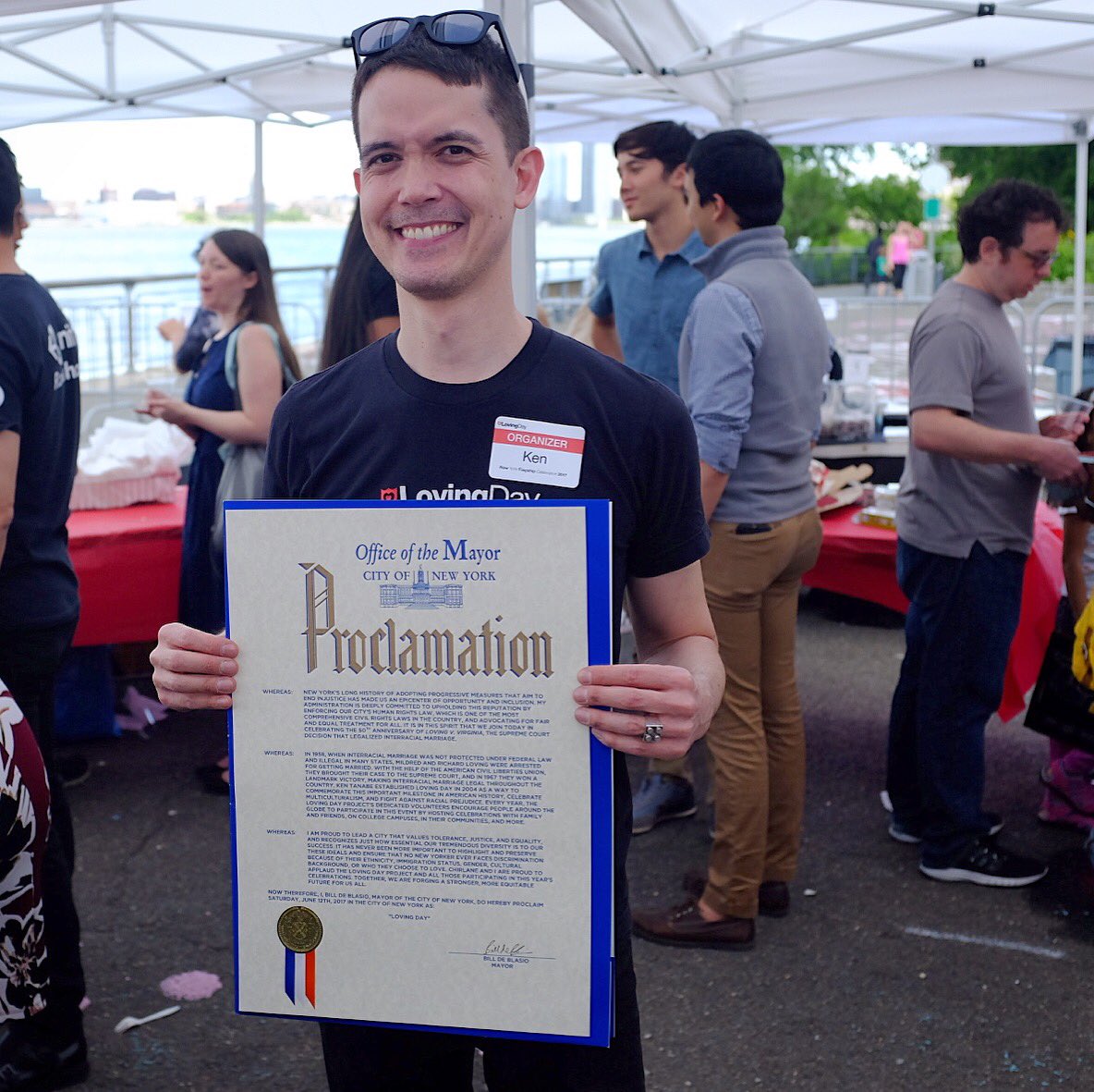 KJMilian's tweet photo. Ken Tanabe (@kentanabe) holds a proclamation from @BilldeBlasio's office declaring Sat, June 12, 2017 #LovingDay in #NYC #50YearsofLoving https://t.co/zzZ0Yq81vT