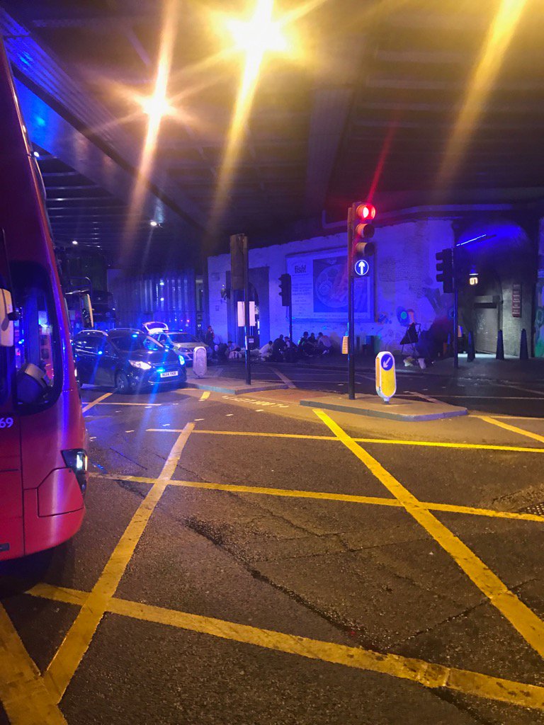 Benleo's tweet photo. Horrific scene at London Bridge... bodies strewn over the pavement. B&amp;Q van mounted the pavement. I feel sick https://t.co/quDYWHRum3