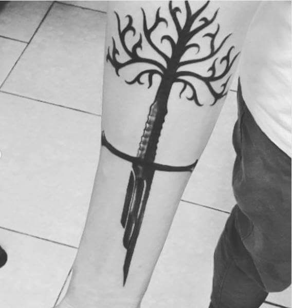 The paritally White Tree of Gondor on a calf Or is that someones  forearm It escapes me  Lotr tattoo Tree of gondor tattoo Tattoos